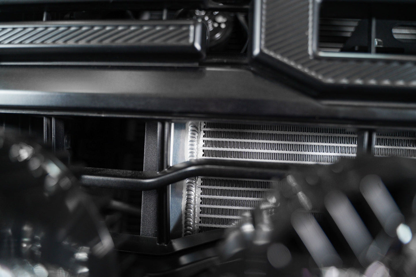 Raptor R High-Mount Heat Exchanger behind grille