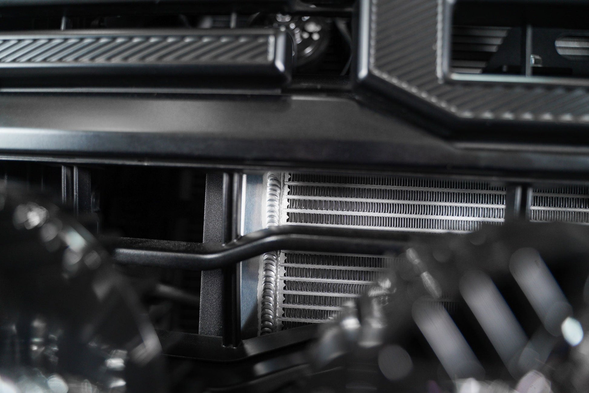 Raptor R High-Mount Heat Exchanger behind grille