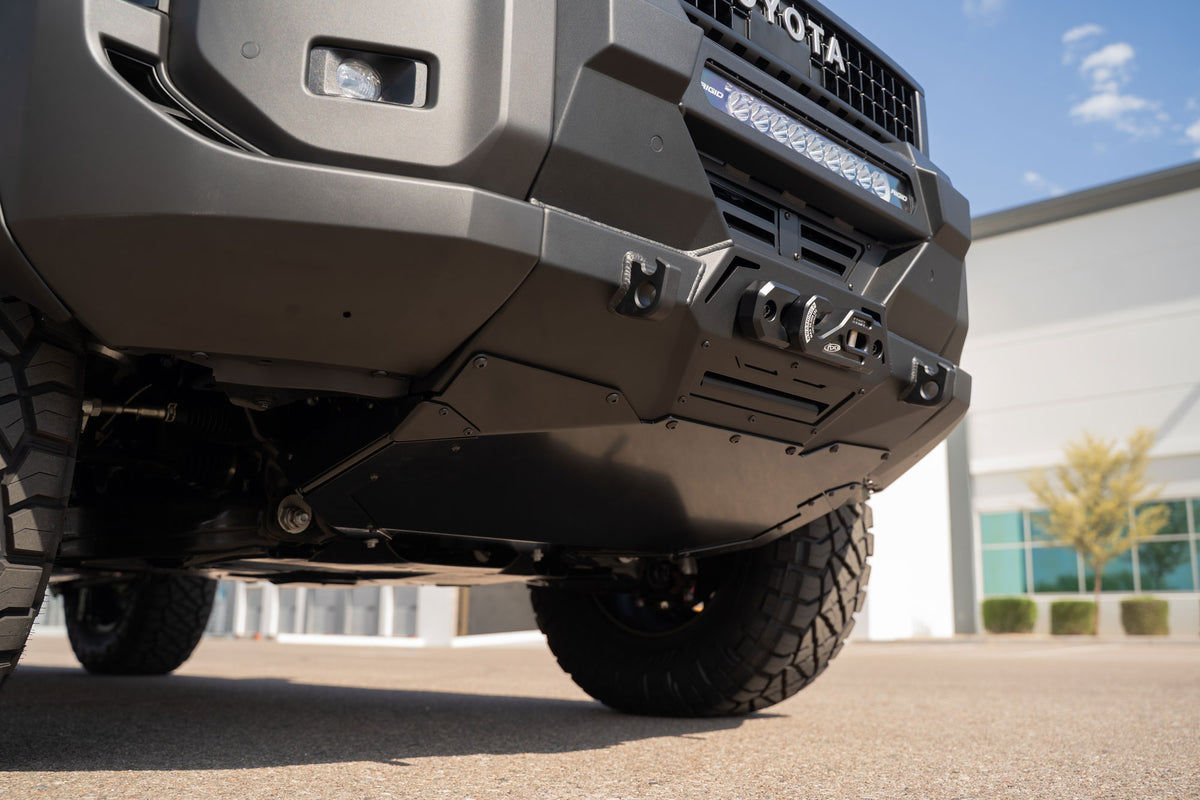 Close low angle view of ADD Land Cruiser 250 skid plate with Stealth front bumper