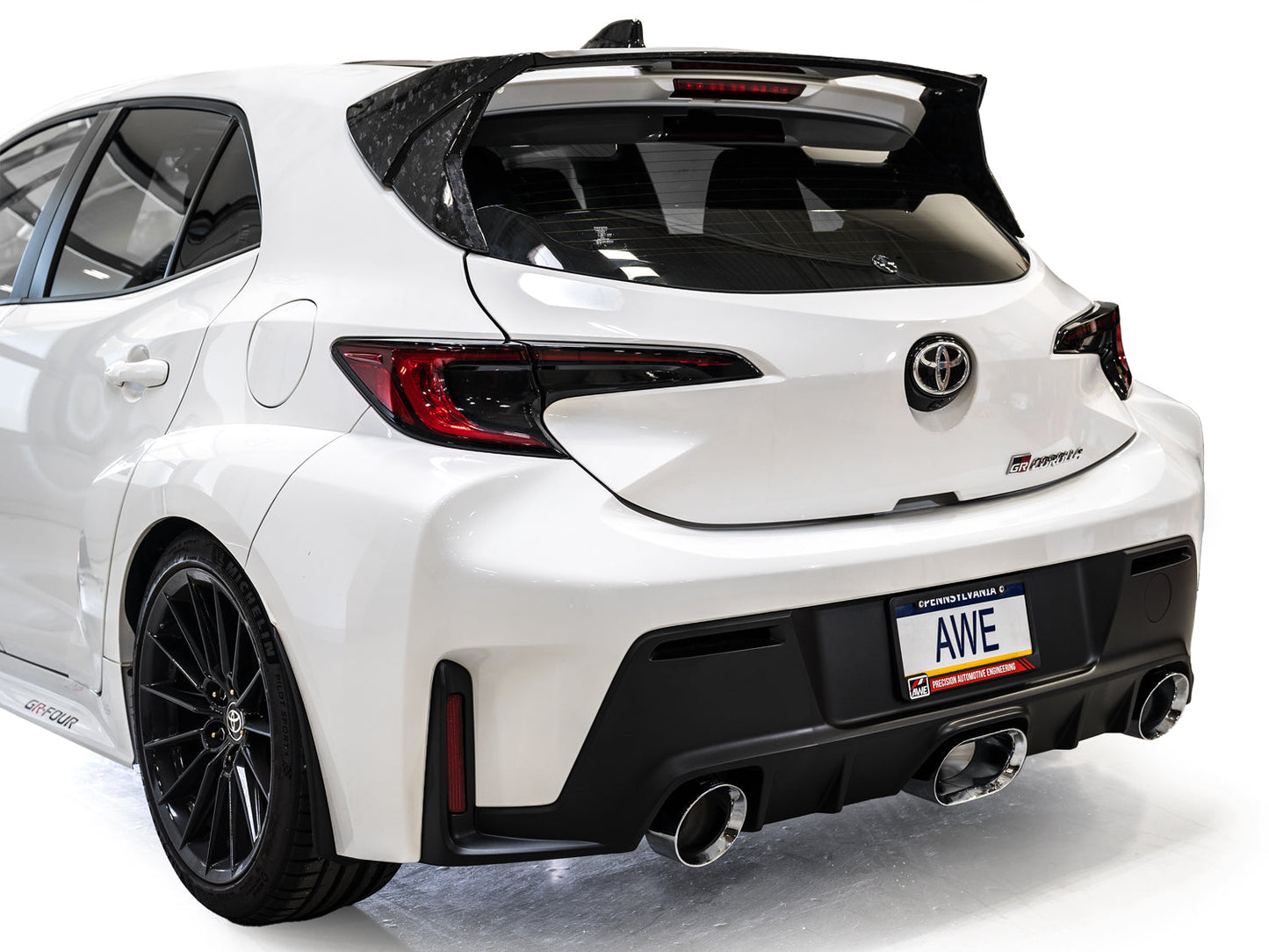 AWE Touring Edition Exhaust rear view on Toyota GR Corolla